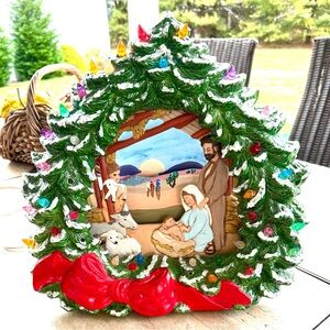 Vintage Christmas ceramic tree portrait with nativity scene.